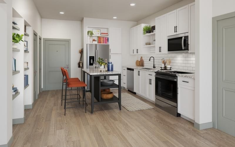 a kitchen with white cabinets